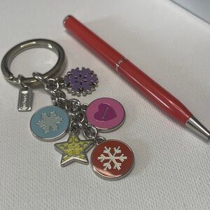 Coach Multicolor Charm Keychain with an Orange Coach Pen